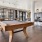Lounge area with pool table, bar area, and cityscape views