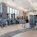 Large fitness center with natural light and various equipment