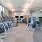 Large fitness center with natural light and various equipment