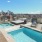 Poolside area with views of Denver cityscape